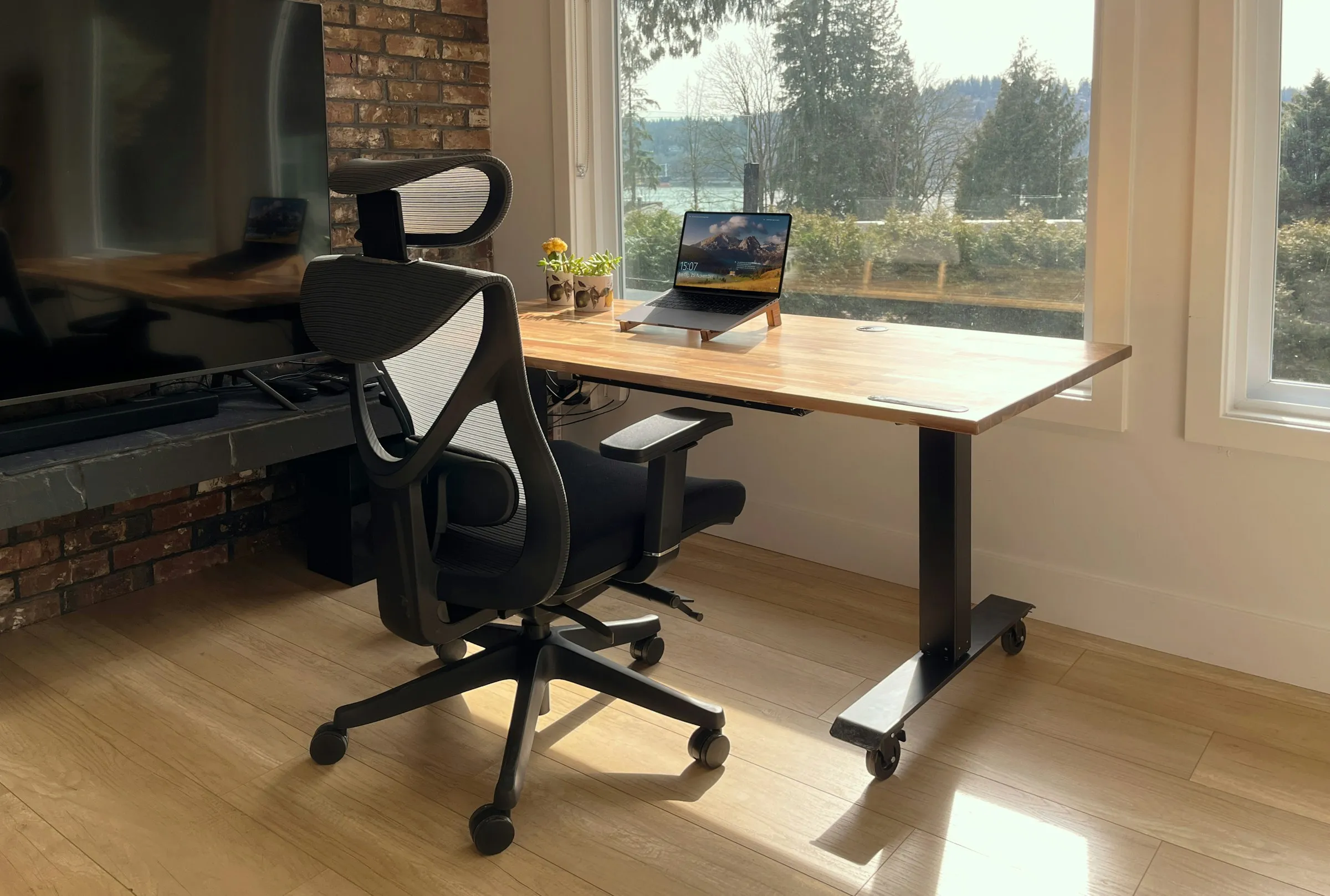 Office chair positioned at a desk in a bright home office workspace
